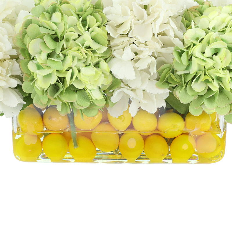 Hydrangeas Arranged in Oval Vase with Lemons