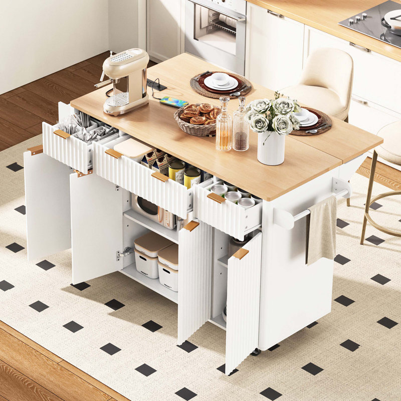 Fluted Wheeled Kitchen Storage Island Cart with Foldable Drop Leaf Countertop and Built-In Power Supply, Four Storage Doors and Three Drawers, Curved Edge Wood Grain Work Surface for Kitchen & Dining Space