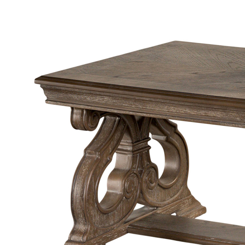 Table basse en bois avec pieds à volutes en chêne