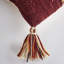 Coussin lombaire brun et beige
