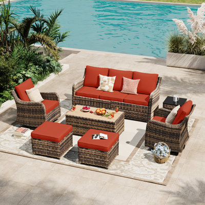 Ensemble de meubles de patio 7 pièces avec fauteuil pivotant Meissalivve, ensemble de conversation pour patio extérieur, ensemble modulaire de patio avec 2 chaises berçantes pivotantes et canapé, 2 repose-pieds et table basse (rouge)
