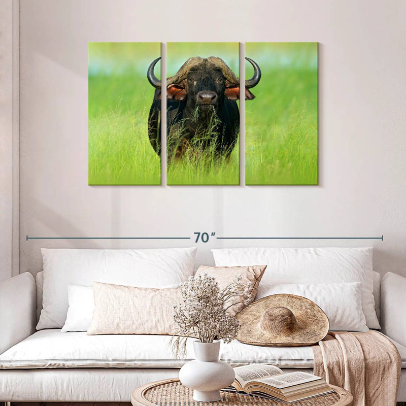 Brampt mangeant un bison, H 28 po x l 45 po