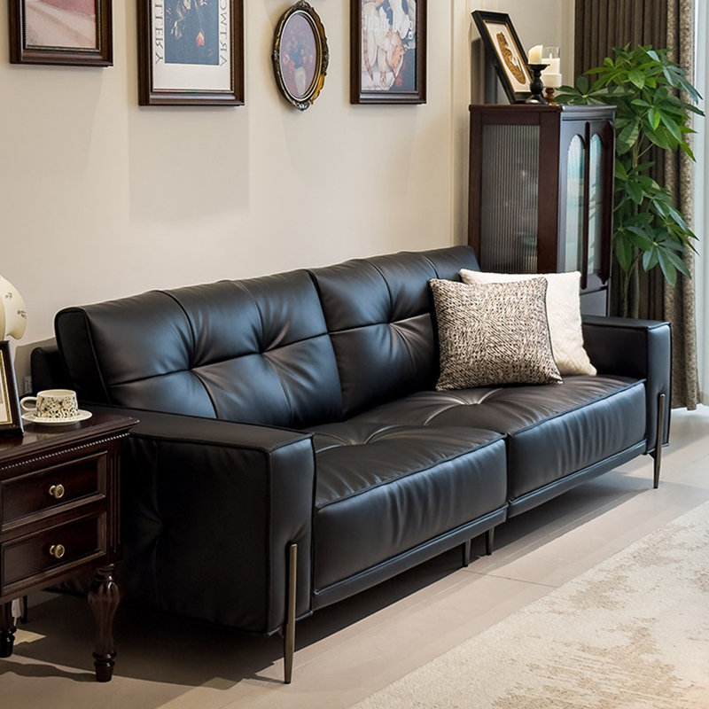Causeuse-coussin modulable noire en cuir véritable
