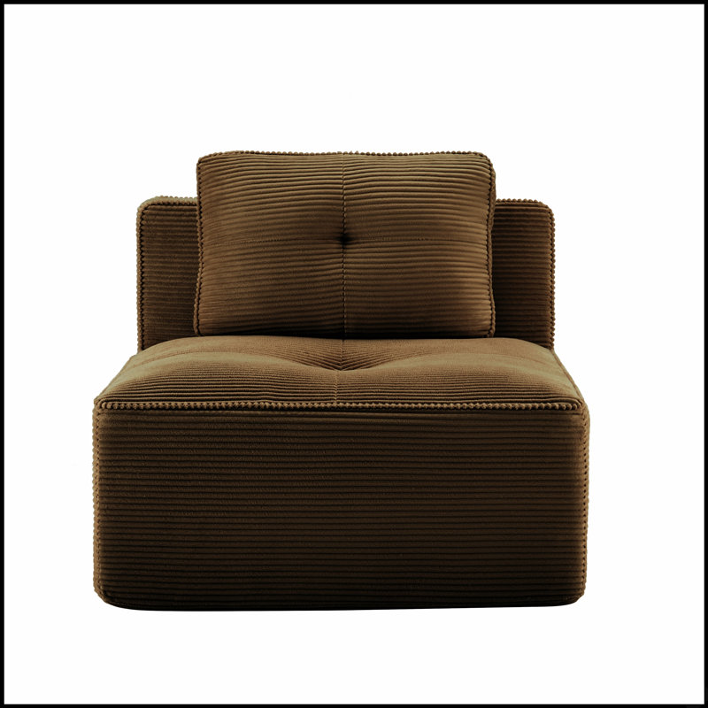 Canapé modulable sans accoudoirs, recouvert d'un tissu en velours côtelé moelleux et doté de coussins de soutien pour une configuration flexible des sièges dans le salon.
