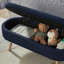 Banc de rangement avec repose-pieds ovale-365113493