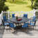 8 Person Patio Dining Set with 53" Round Metal Dining Table and 8 Stackable Textilene Chairs