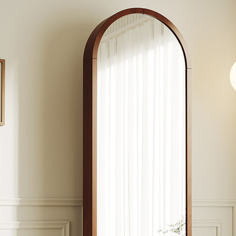 The multi-functional solid wood full-length mirror can be stored and moved on the back of the floor