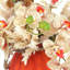 Orchid and Pampas Arranged in Decorative Glass Vase