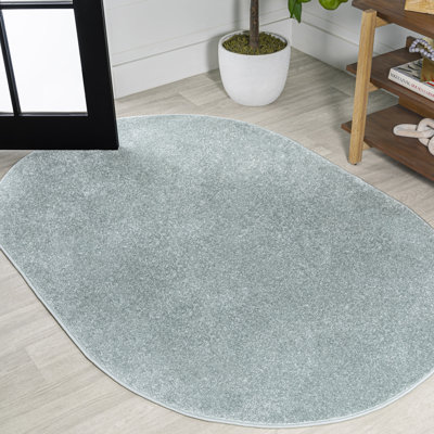 Tapis bleu uni à poils courts Arzel