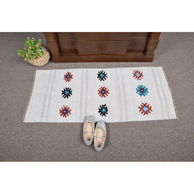 Handwoven Small Vintage Turkish Kilim Rug with Distinctive Patterns and Elegant White Finish