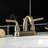 Kingston Brass Restoration Two-Handle 3-Hole Deck Mount 4" Centerset Bathroom Faucet with Plastic Pop-Up-66069158