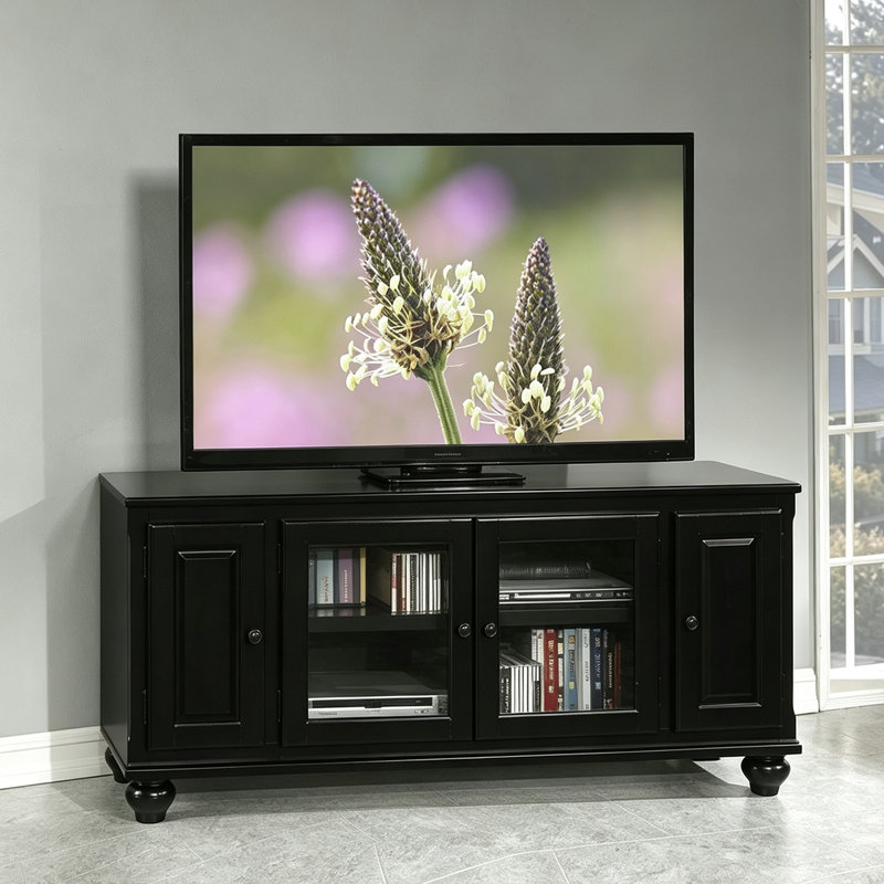 Meuble télé en bois noir avec placards de rangement fermés en verre et panneaux pleins