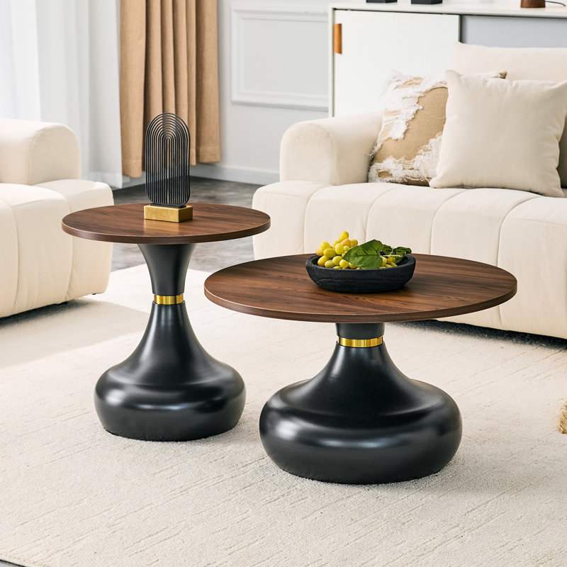 Ensemble de tables basses gigognes abordables de luxe en forme de gourde. Plateau de table en panneau de fibres à densité moyenne noyer avec une base en métal peinte en noir. Ensemble de tables basses deux pièces. Idéal pour le salon et la salle à manger.