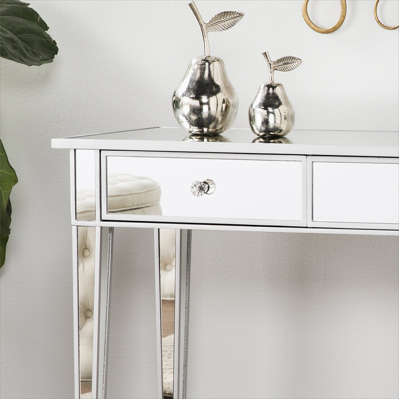 Console glamour à 2 tiroirs en miroir avec boutons en faux cristal, parfaite pour rehausser l'élégance et la fonctionnalité de n'importe quelle pièce.