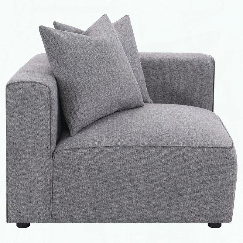 Fauteuil d'angle modulaire, tissu gris et coussin décoratif