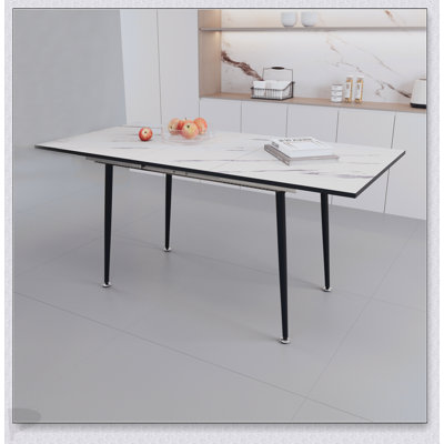 47 To 63 Inch Expandable MDF Dining Table With White Marble Pattern, Modern Industrial Design, Tapered Metal Legs For Versatile Use
