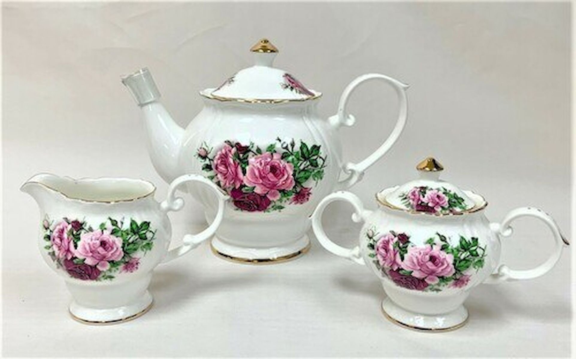 https://assets.wfcdn.com/im/03651431/compr-r85/1399/139917164/rosdorf-park-aleck-27oz-floral-teapot.jpg