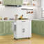 Îlot de cuisine avec rangement, chariot de cuisine roulant avec prises CA et ports USB, support à micro-ondes avec serviette et support à épices-339198234