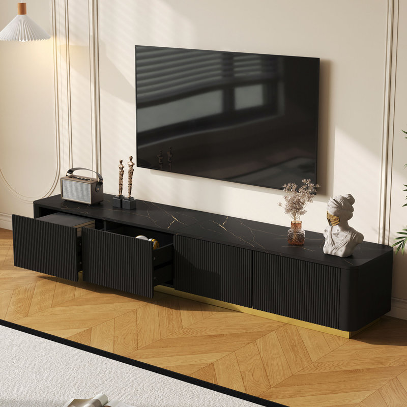 Meuble télé de luxe cannelé pour téléviseur de 85 po ou moins, console multimédia en faux marbre avec 4 tiroirs, centre de divertissement à profil courbé avec base dorée pour le salon