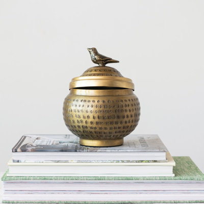 Feliberto Round Hammered Metal Container with Bird Finial