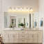 Luminaire de salle de bain moderne à DEL en cristal au-dessus d'un miroir - luminaire mural 6 lumières