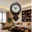 Horloge murale européenne à pendule de style rétro avec mouvement à quartz, grands chiffres arabes et finition dorée brossée pour la maison et le bureau