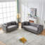 Canapé Chesterfield confortable en velours au design traditionnel et élégant, parfait pour le salon
