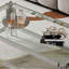 Tempered glass coffee table with double layers and mirror-finished stainless steel frame, durable and elegant