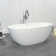 66.93" L X 30.7" W X 22.05" H Matte White Freestanding Solid Surface  Bathtub SWBT01-6731