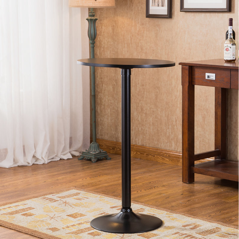 Table ronde noire avec pieds et base en métal noir