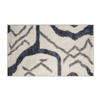 Tapis beige lavable à la machine