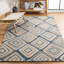 Tapis géométrique en laine touffeté à la main Boarer-647750281