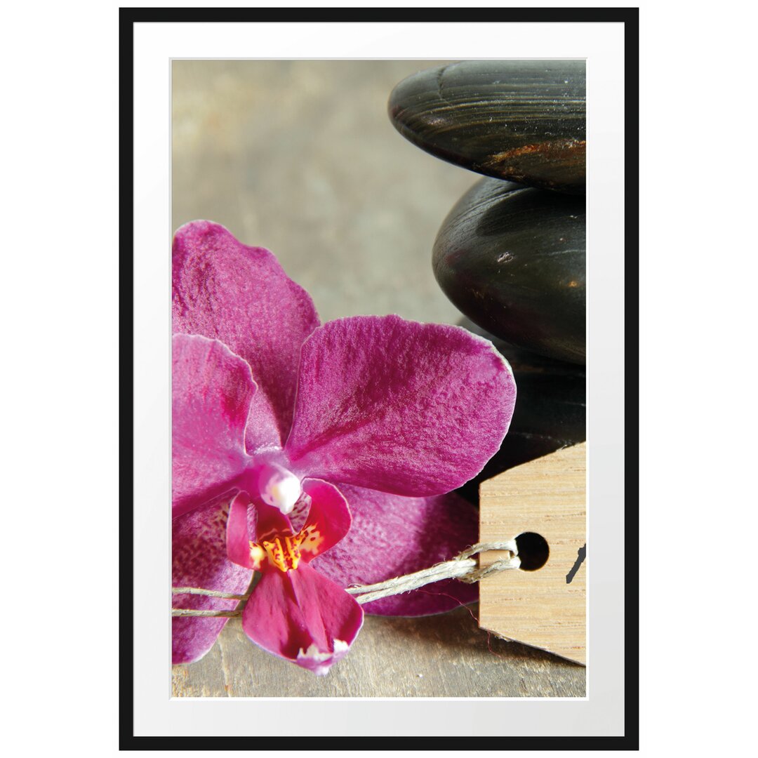 Gerahmtes Poster Auszeit Orchidee mit Zen Steinen