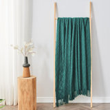 Knitted Blanket with Tassel Trim