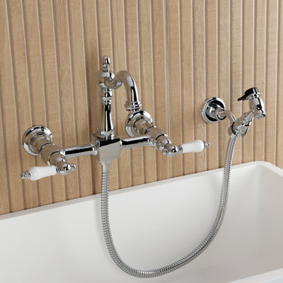 Kingston Brass Heritage Double-Handle 3-Hole Wall-Mount Bridge Kitchen Faucet With Brass Sprayer
