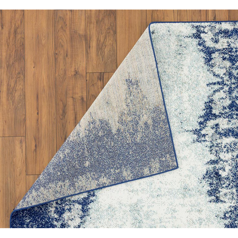 Blue and Beige Abstract 5' x 7' Synthetic Area Rug
