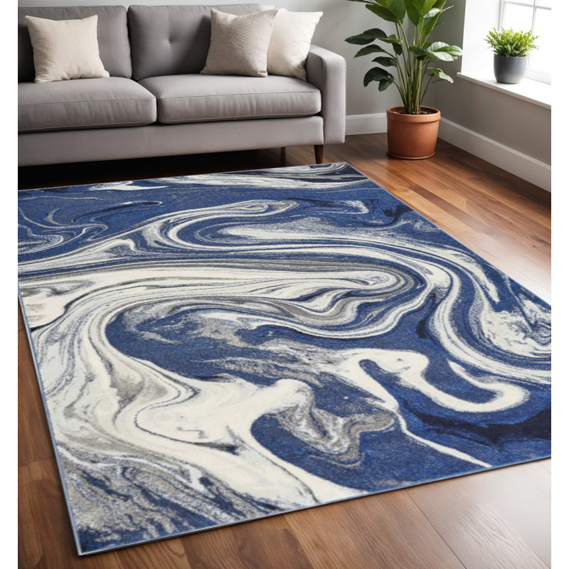 Tapis abstrait bleu / blanc touffeté