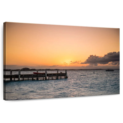 Sunset over wooden dock Aletra