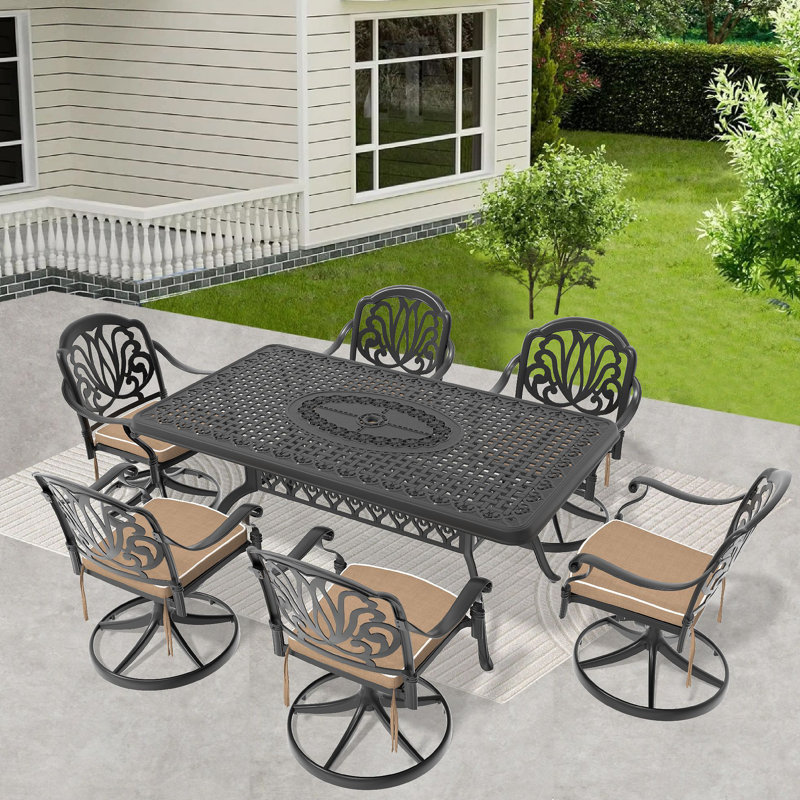 L'ensemble de salle à manger toutes saisons en fonte d'aluminium comprend 6 chaises pivotantes et une table rectangulaire avec une structure noire (même référence: W1710S00465)
