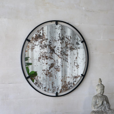 Miroir rond avec design industriel