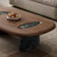 Table basse ovale en noyer fritté + bois manufacturé