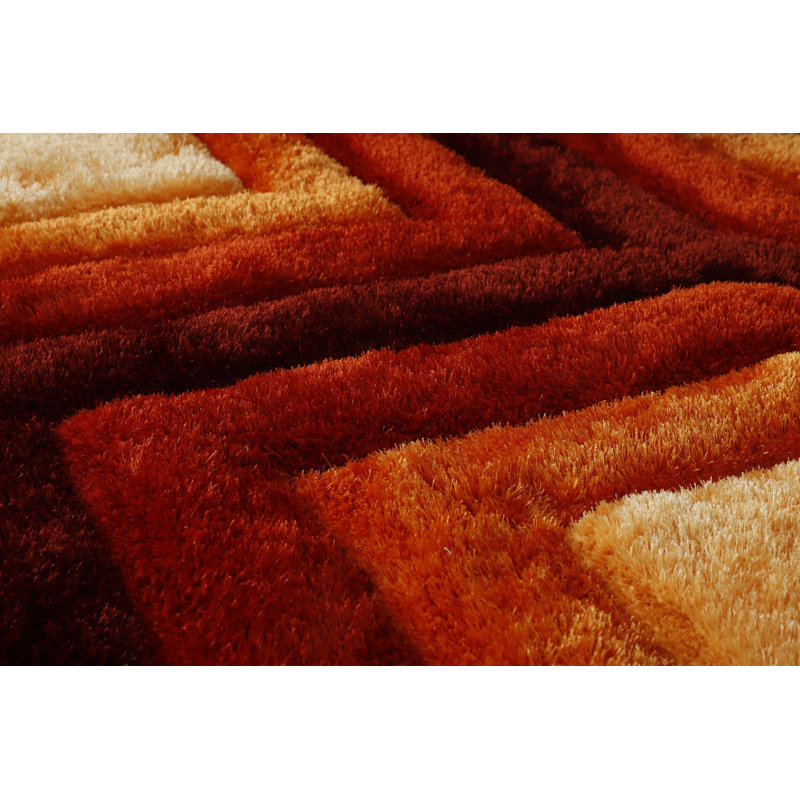 Tapis orange / rouge / noir à poils longs Corey-Leigh, Rond 7 pi