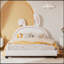 Lit plateforme tapissier en cuir avec ornement en forme de lapin-763780370-763780371