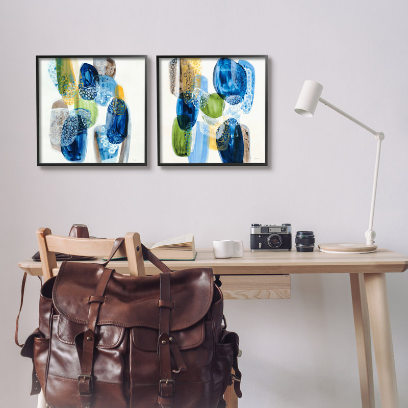 «Round Abstract Pebbled Shapes Layered Blue Tones» par Liz Jardine - ensemble de 2 peintures sur cadre flottant