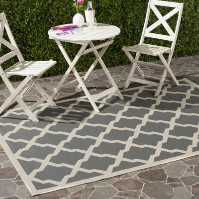 Joyner Geometric Hand Woven Indoor / Outdoor Area Rug