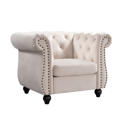 Chesterfield style tufted back armchair