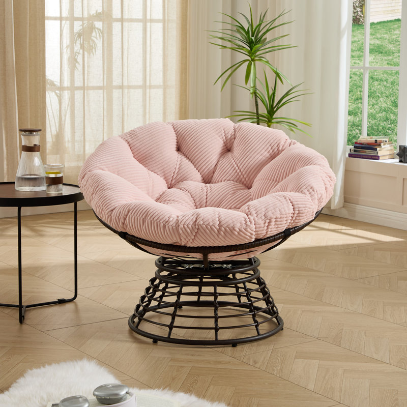 Chaise pivotante 360 avec un design ergonomique, coussin rose épais, structure en acier brun, pour les espaces intérieurs et extérieurs