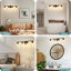 Éclairage de meuble-lavabo à intensité variable Aanay-956567887-952759154