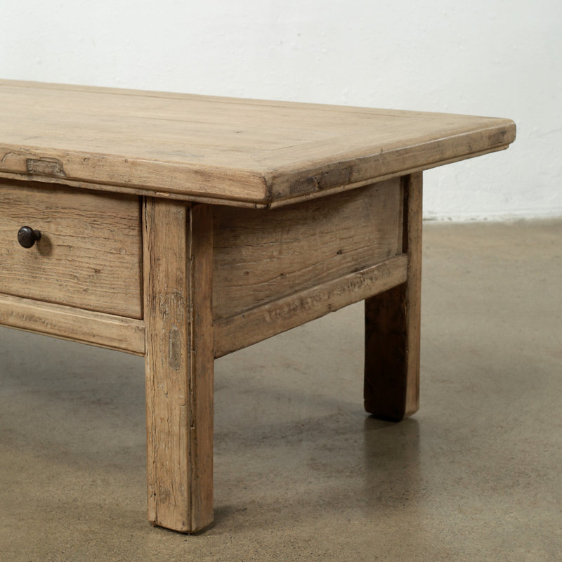 63 Inches Wide Coffee Table with Three Drawers Weathered Natural
