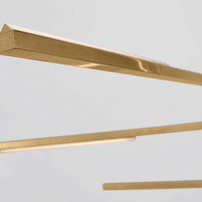 Sean Lavin 7 light Chandelier in Natural Brass finish.